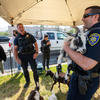 UCPD officer holding a goat.