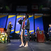 Graduate blowing kiss on stage