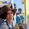 A volunteer paints the mural in honor of California Clean Air Day on Tuesday, Oct. 3, 2023 at the R'Garden. (UCR/Stan Lim)