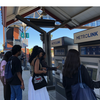 students buy train tickets