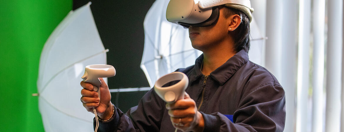student in VR goggles