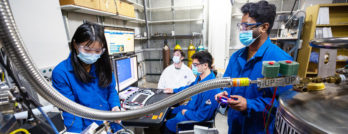 Engineering grad students working UCR labooratory