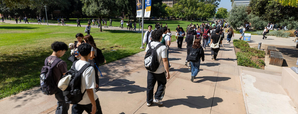 student walking to classes