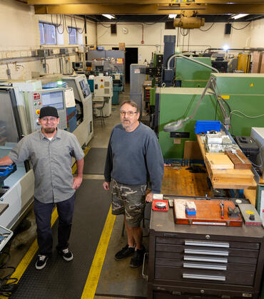 Eric Gazelle and Jay Lefler in CNAS machine and glass shop