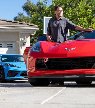 Ted Garland with his Corvettes and Porsche