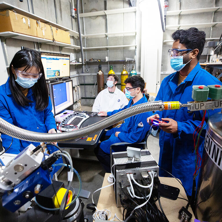 Engineering grad students working UCR labooratory