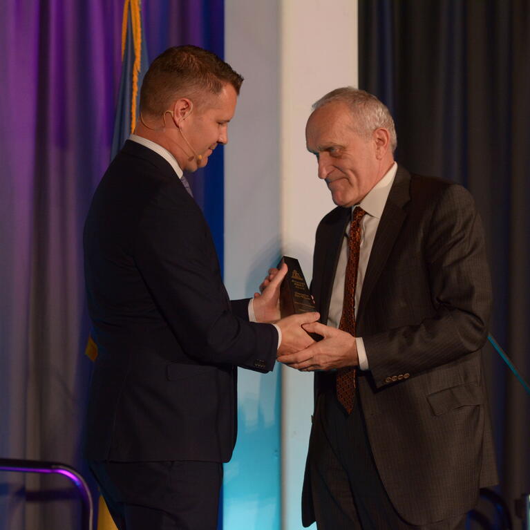 Chancellor Wilcox getting an award