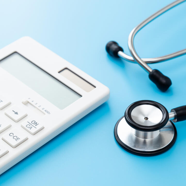 calculator and stethoscope