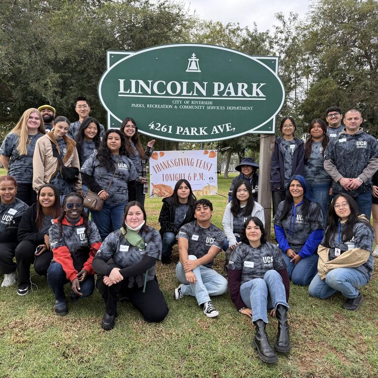 UCR students posing for a photo at Lincoln Park after community service event
