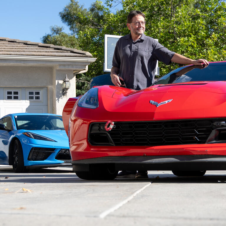 Ted Garland with his Corvettes and Porsche
