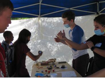 David Nikom and Courtney Scaramella with students