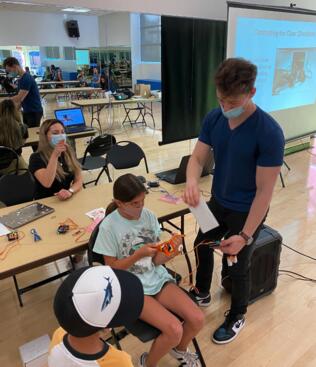 David Nikom and student