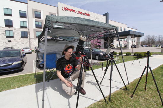 Morris Maduro prepares to watch the solar eclipse in Indiana