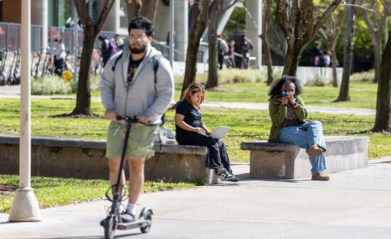 Students track speed of scooter rider