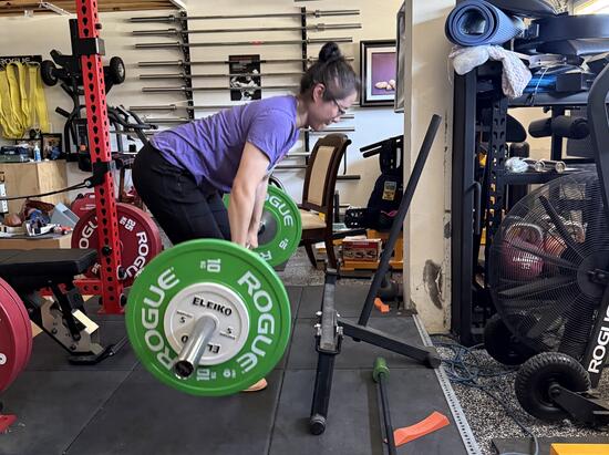 Rachel Wu lifts weights