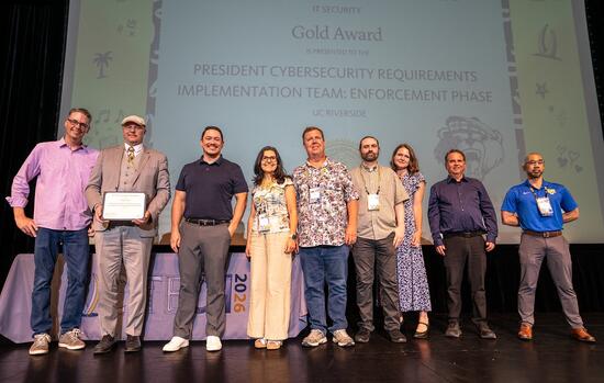 ITS team accepts award